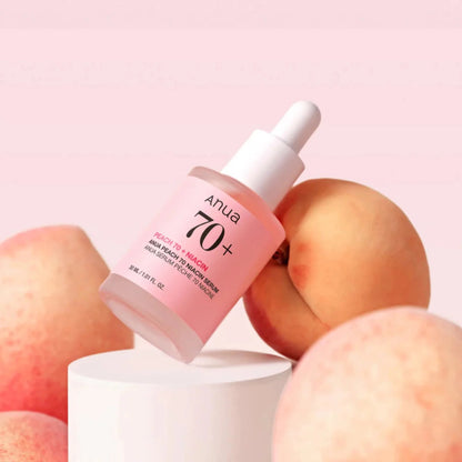 Anua Peach 70% + Niacinamide 5% Serum combining 70% peach extract and 5% niacinamide for a radiant glass skin finish.